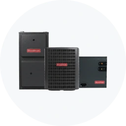 Goodman AC gas heat unit featuring a compact design with a black exterior and red branding.