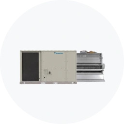 Commercial package unit with a beige exterior and metal components, designed for HVAC applications.