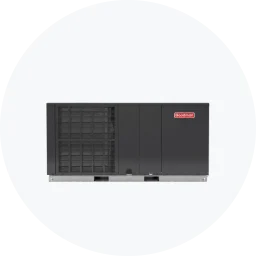 Mobile home air conditioning unit with a sleek black exterior and a prominent red logo.