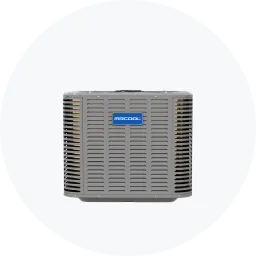 Gray outdoor condenser unit with a blue logo, featuring a grid-like design for airflow.