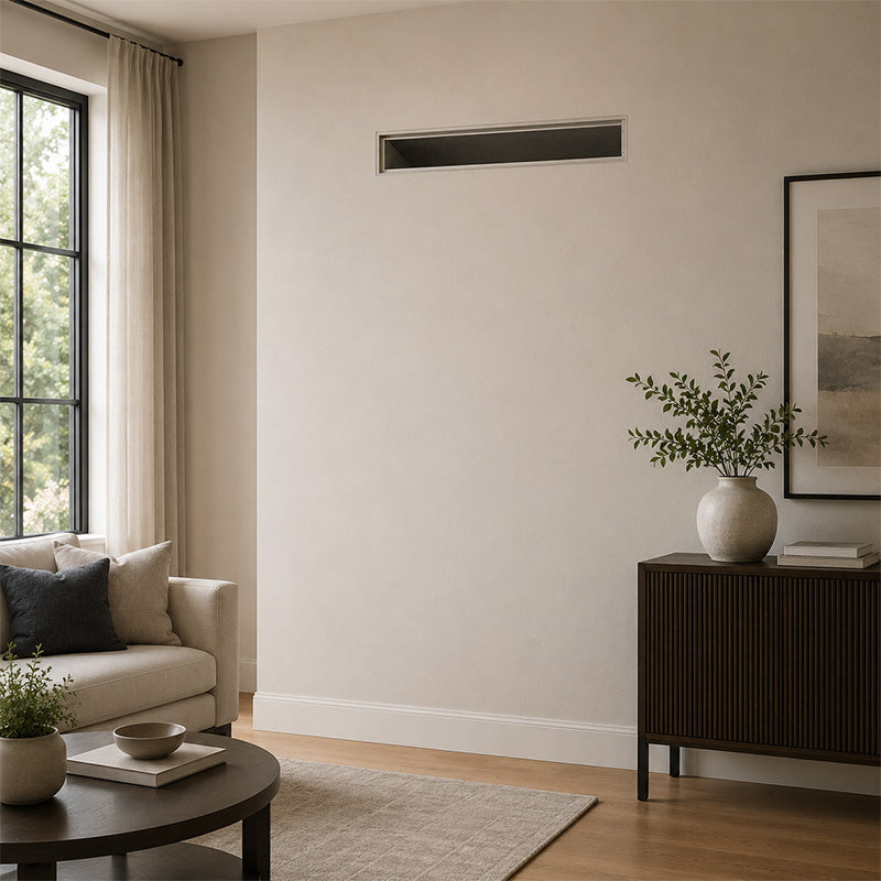 Daikin Aurora horizontal ducted mini split air handler concealed inside family room wall with linear supply vent