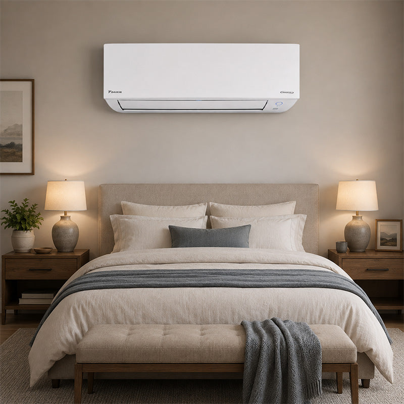 Daikin ENTRA wall-mounted mini-split indoor unit installed in a bedroom