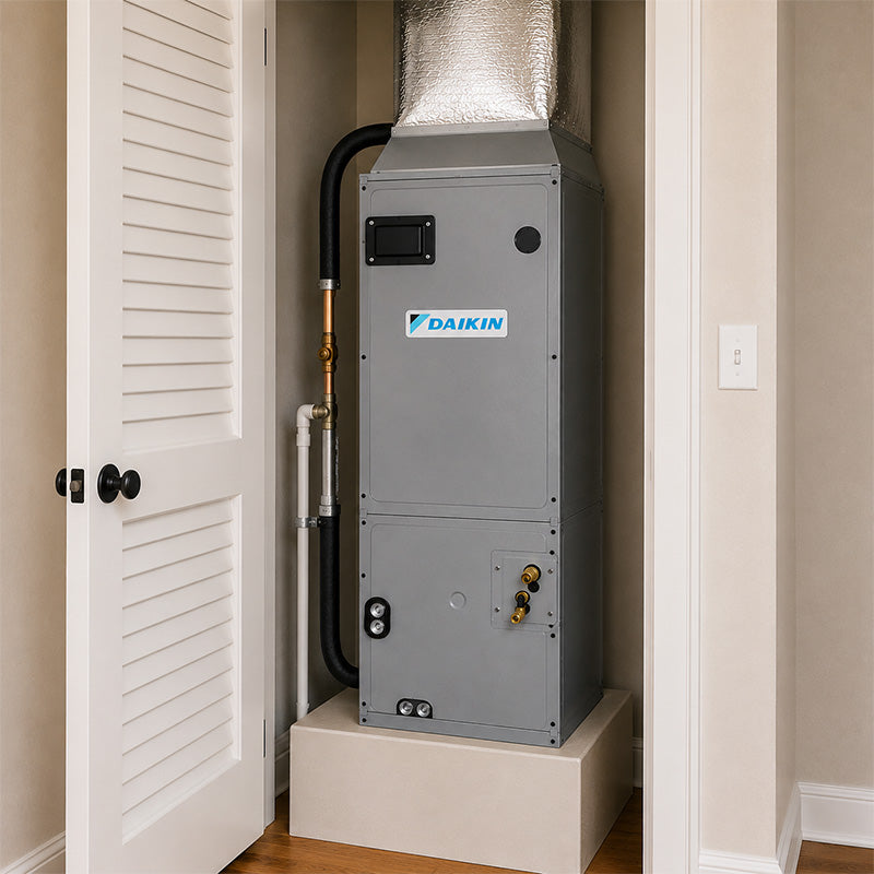 Daikin SkyAir ducted mini split air handler installed inside residential utility closet with connected ductwork
